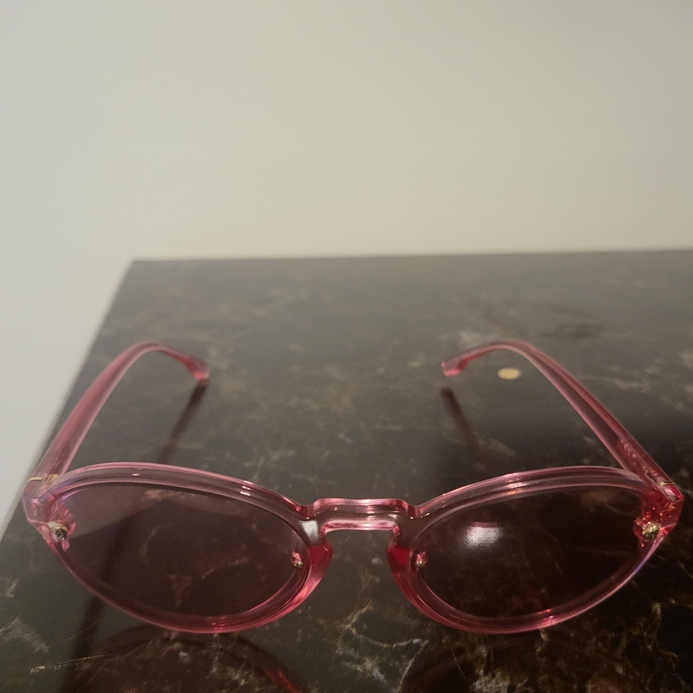 Pink Versace sunglasses with Medusa labels for women